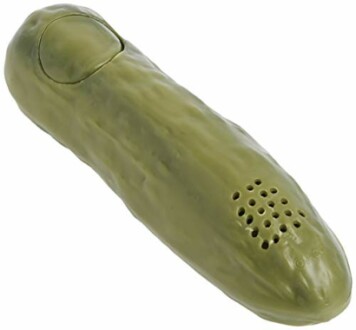 Pickle-shaped toy with speaker holes