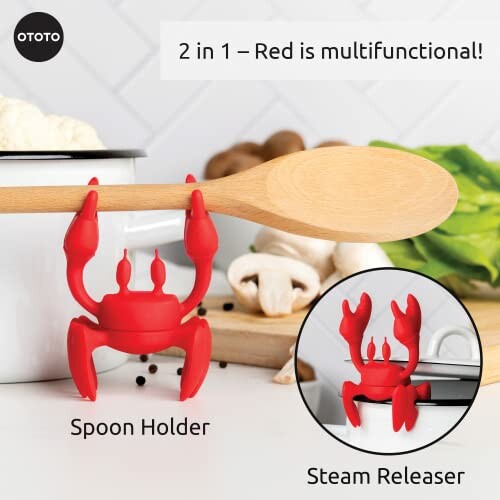 Red crab-shaped spoon holder on pot with wooden spoon