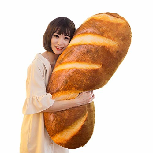 Woman hugging a large bread-shaped pillow